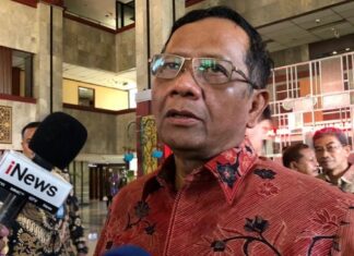 Menteri Koordinator Politik, Hukum dan Keamanan (Menko Polhukam) Mahfud MD. (Suara.com/Ria Rizki)