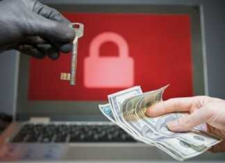 Ilustrasi uang tebusan diserahkan agar peretas membuka akses komputer yang dikunci oleh ransomware. [Shutterstock]