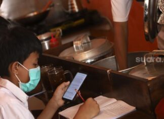 Ilustrasi siswa belajar secara online. [Suara.com/Angga Budhiyanto]